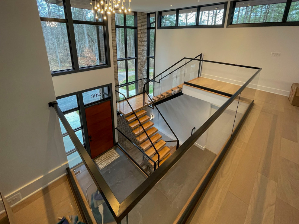 Staircase - large modern wooden floating staircase idea in DC Metro
