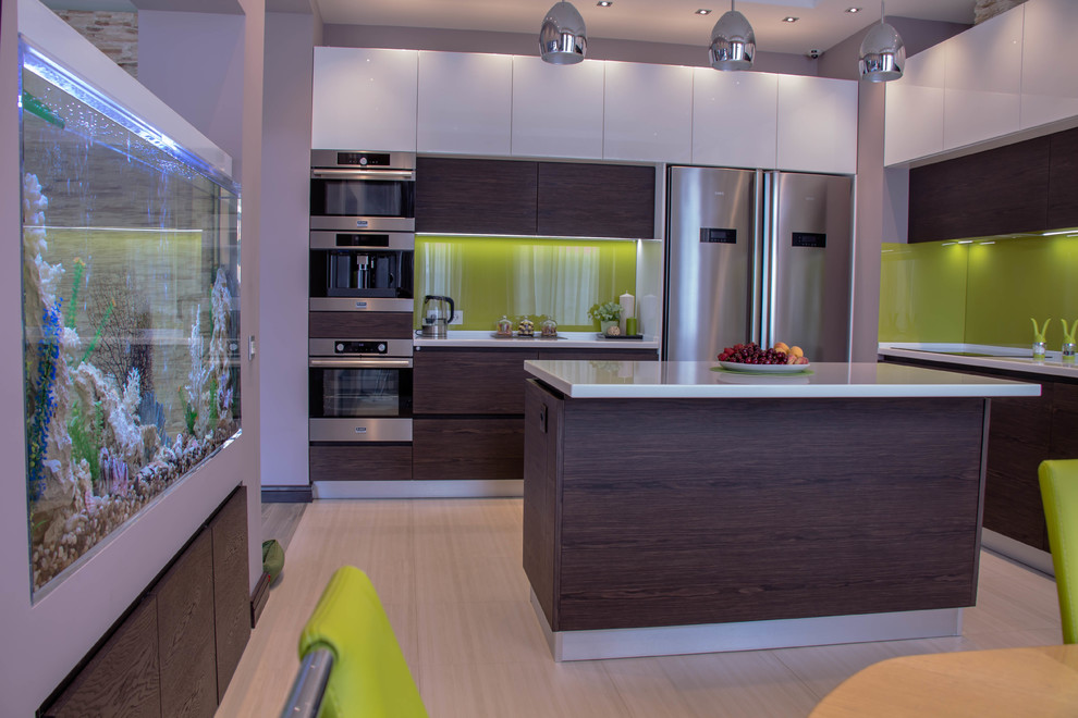Inspiration for a large contemporary u-shaped eat-in kitchen in Moscow with a drop-in sink, flat-panel cabinets, dark wood cabinets, solid surface benchtops, green splashback, glass sheet splashback, stainless steel appliances, laminate floors, with island, beige floor and beige benchtop.