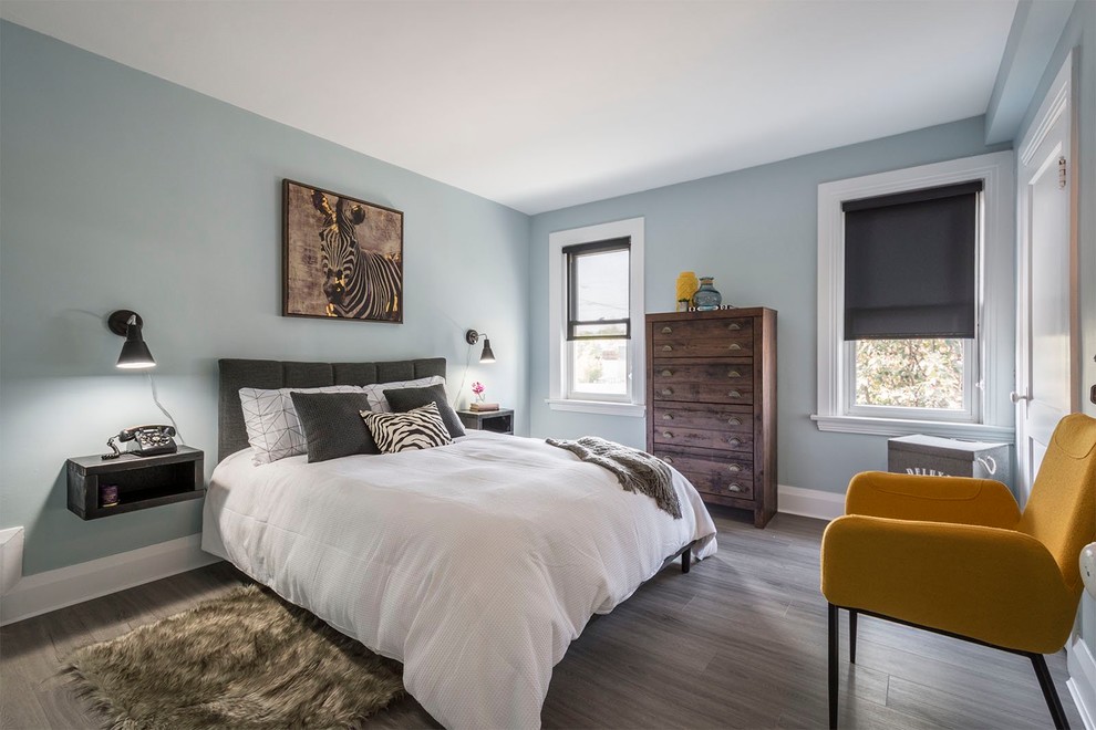 Design ideas for a small transitional master bedroom in Toronto with blue walls, vinyl floors and grey floor.