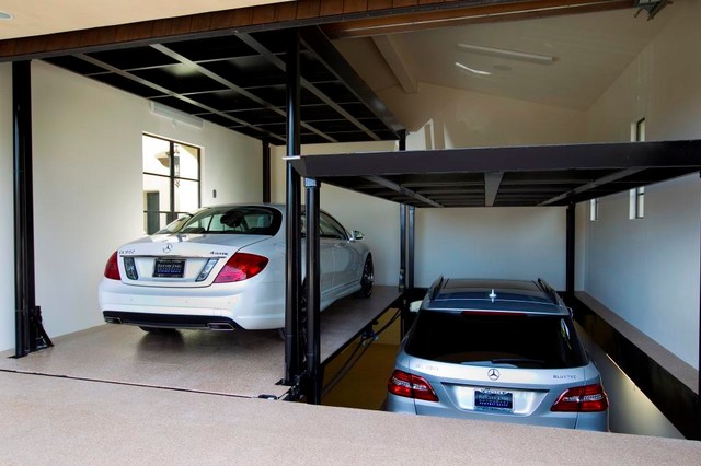 Custom car lift in California garage  Mediterranean  Garage  Los Angeles  by McKinley 