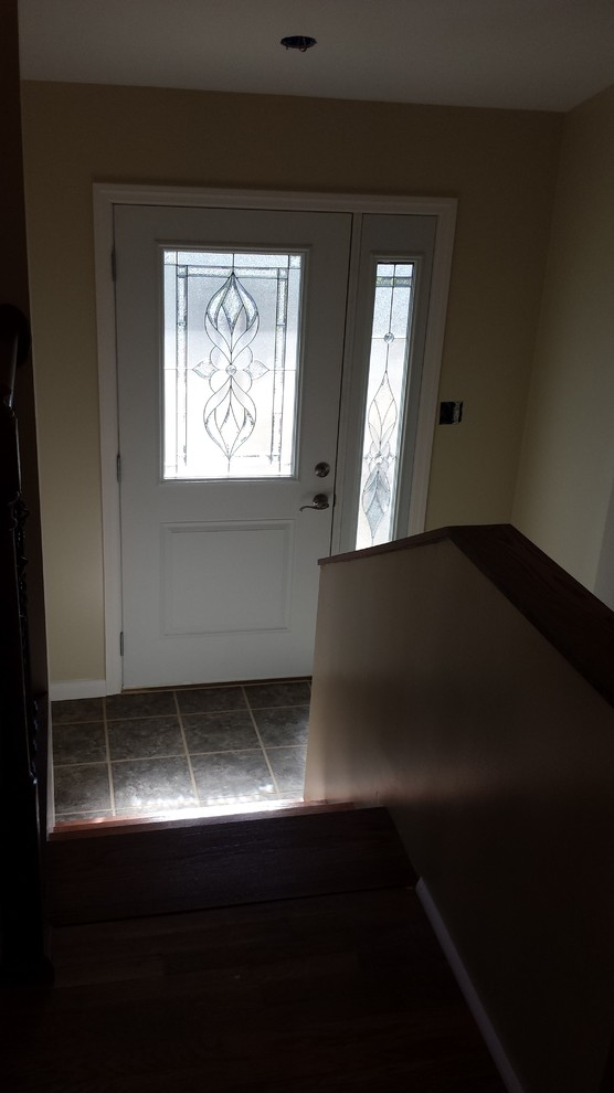 Foyer - contemporary ceramic tile foyer idea