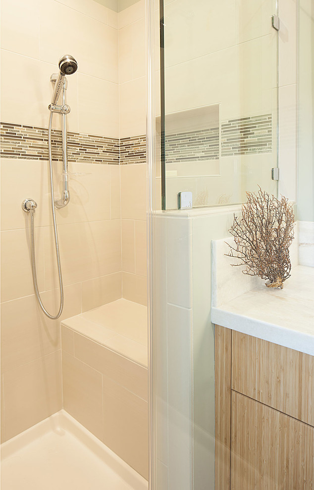 Mid-sized beach style master bathroom in San Francisco with an undermount sink, flat-panel cabinets, medium wood cabinets, engineered quartz benchtops, an open shower, a two-piece toilet, beige tile, porcelain tile, green walls and porcelain floors.