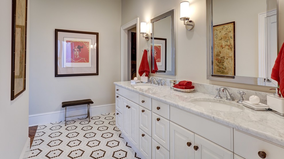 Inspiration for an eclectic master mosaic tile floor bathroom remodel with raised-panel cabinets, white cabinets, an undermount sink, quartz countertops and white countertops