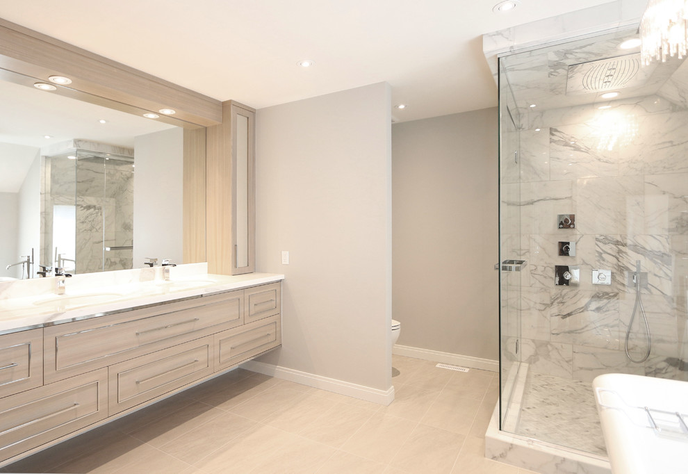 Example of a transitional bathroom design in Calgary