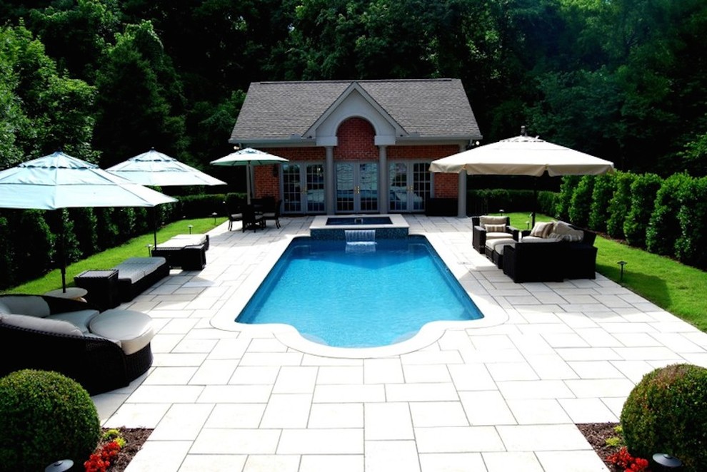 Hot tub - mid-sized transitional backyard concrete and rectangular hot tub idea in Nashville
