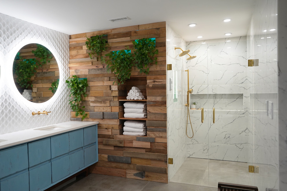 Example of a large danish master white tile and porcelain tile porcelain tile and gray floor bathroom design in Atlanta with flat-panel cabinets, blue cabinets, a one-piece toilet, blue walls, an undermount sink, quartz countertops, a hinged shower door and white countertops