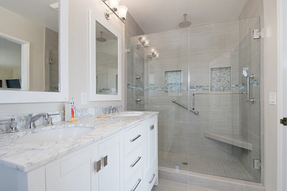 Design ideas for a small beach style master bathroom in San Diego with recessed-panel cabinets, white cabinets, an alcove tub, a double shower, a two-piece toilet, gray tile, porcelain tile, grey walls, porcelain floors, an undermount sink, quartzite benchtops, grey floor and a sliding shower screen.