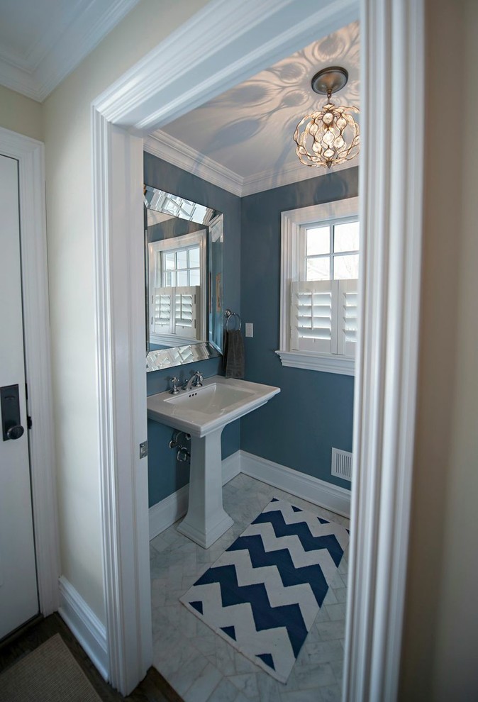 Transitional powder room in New York.