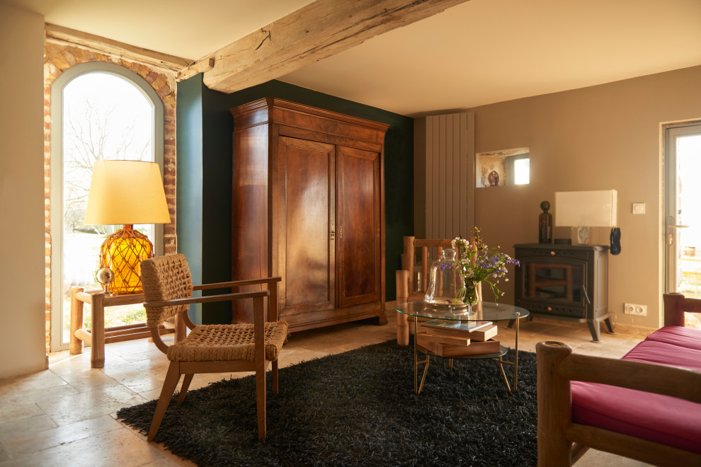 Example of a farmhouse living room design in Paris