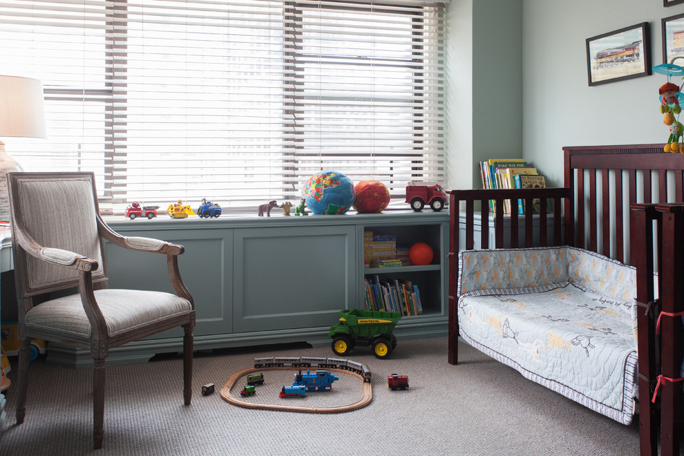 Example of a mid-sized transitional gender-neutral carpeted and beige floor nursery design with gray walls