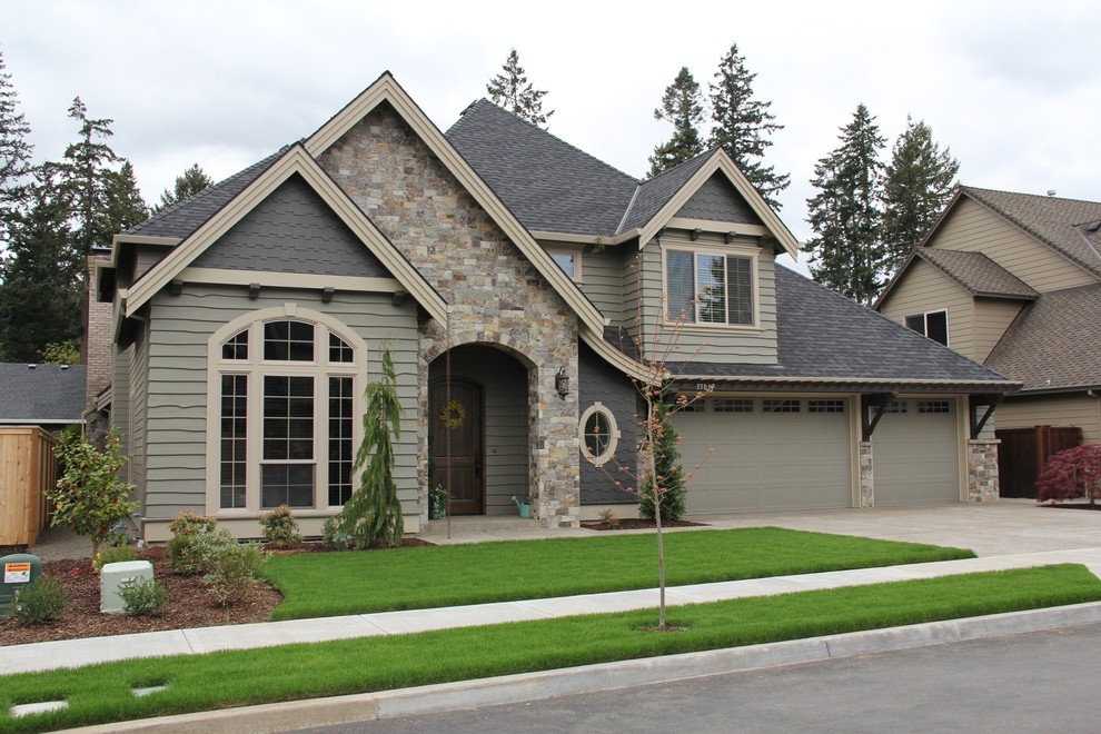 Inspiration for a traditional exterior in Portland with stone veneer.