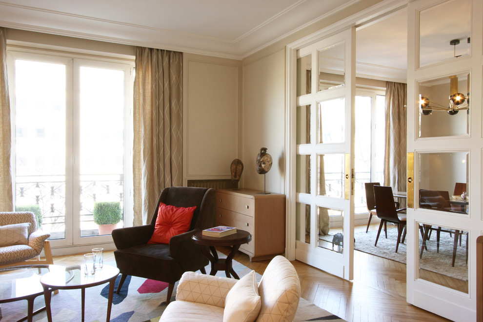 Photo of a mid-sized contemporary formal enclosed living room in Paris with beige walls.