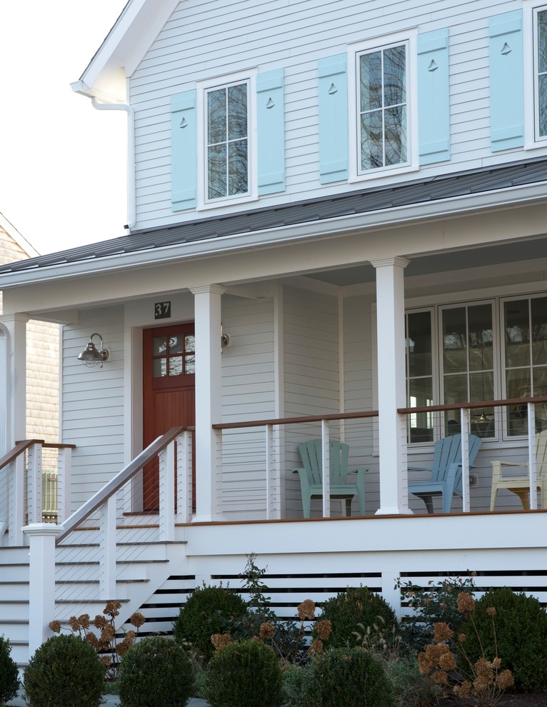 Mid-sized coastal white two-story wood gable roof idea in New York with a metal roof
