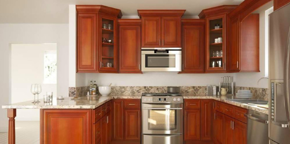 Mid-sized transitional u-shaped open concept kitchen photo with a drop-in sink, raised-panel cabinets, medium tone wood cabinets, granite countertops, stainless steel appliances, a peninsula and gray countertops