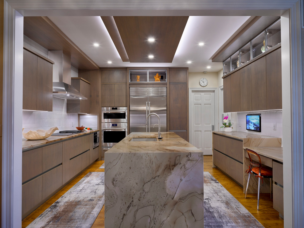 Mid-sized trendy medium tone wood floor and brown floor kitchen photo in Cleveland with an undermount sink, flat-panel cabinets, medium tone wood cabinets, granite countertops, white backsplash, porcelain backsplash, stainless steel appliances, an island and beige countertops