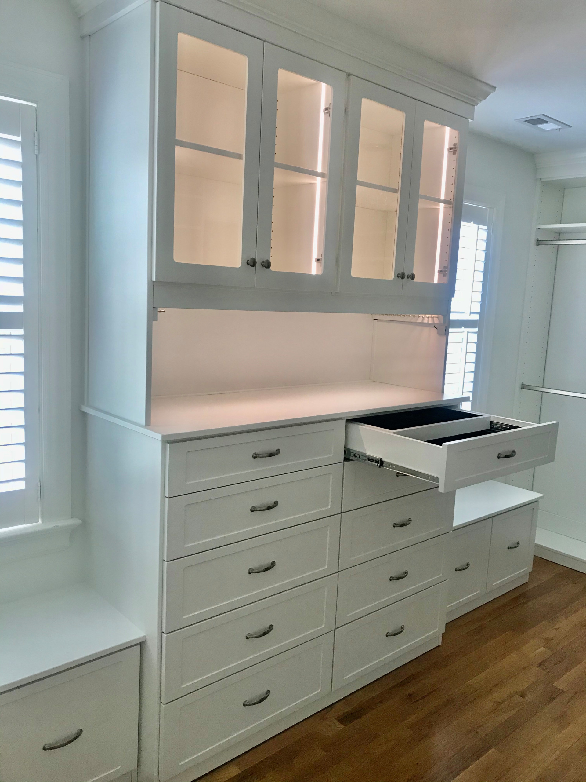Lighted White Dressing Room with Chandeliers