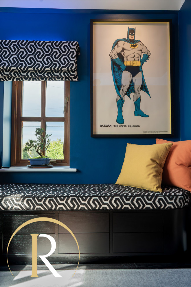 Example of a small eclectic vinyl floor and black floor kids' study room design with blue walls