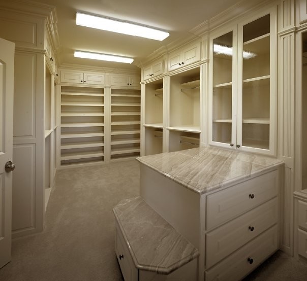 This is an example of a traditional storage and wardrobe in Dallas.