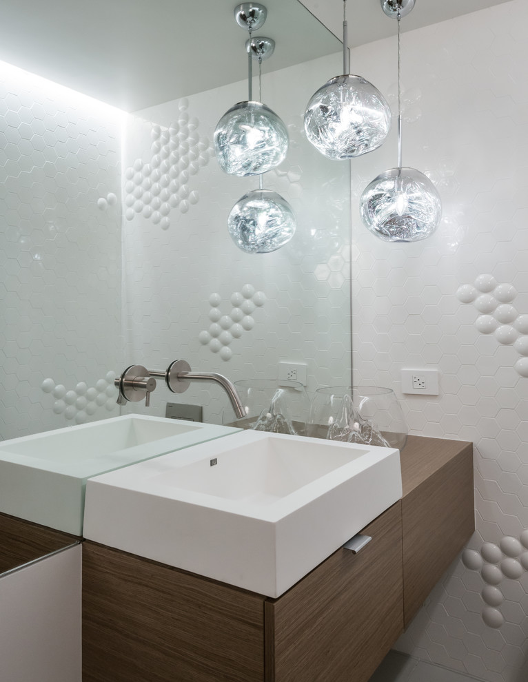 Contemporary powder room in Other with flat-panel cabinets, medium wood cabinets and white walls.