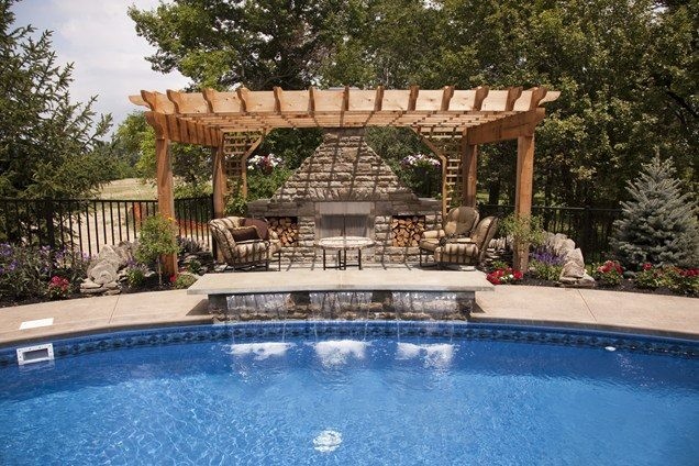 Large arts and crafts backyard stone and custom-shaped natural pool fountain photo