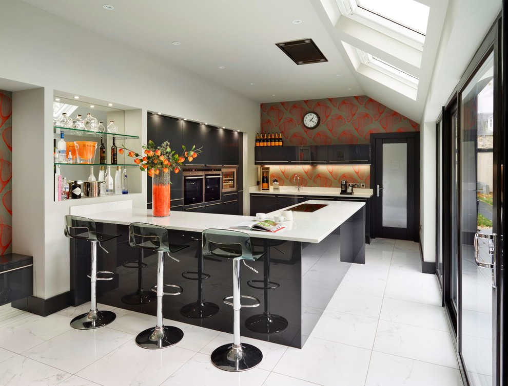 Inspiration for a contemporary u-shaped kitchen in Other with flat-panel cabinets, black cabinets and a peninsula.