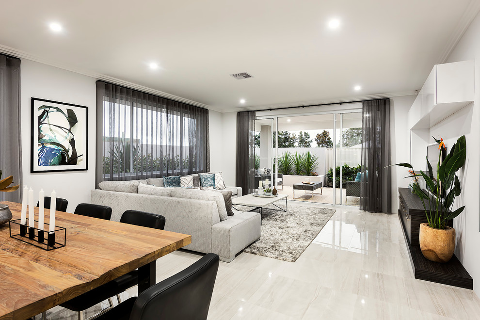 Photo of a mid-sized contemporary open concept family room in Perth with white walls, porcelain floors and a wall-mounted tv.
