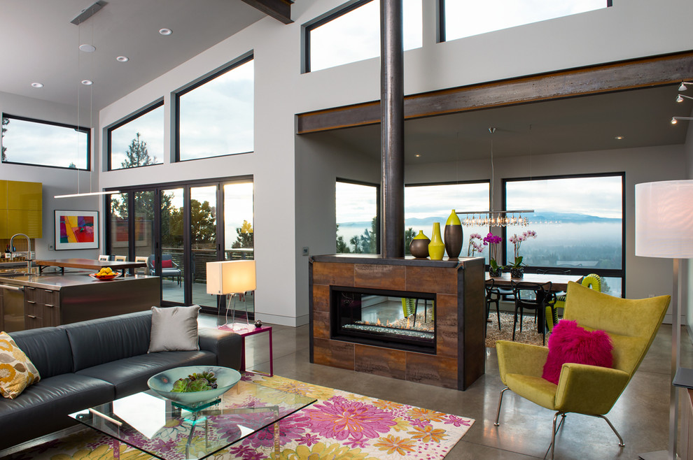 Mid-sized contemporary formal open concept living room in Other with concrete floors, a two-sided fireplace, a metal fireplace surround, white walls and a wall-mounted tv.