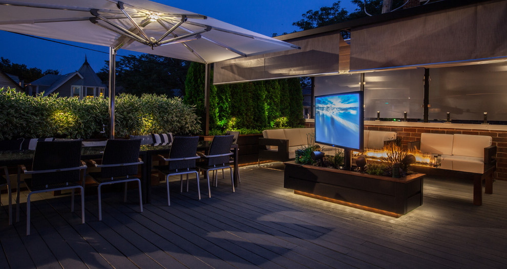 Mid-sized transitional rooftop outdoor kitchen deck photo in Chicago with a pergola