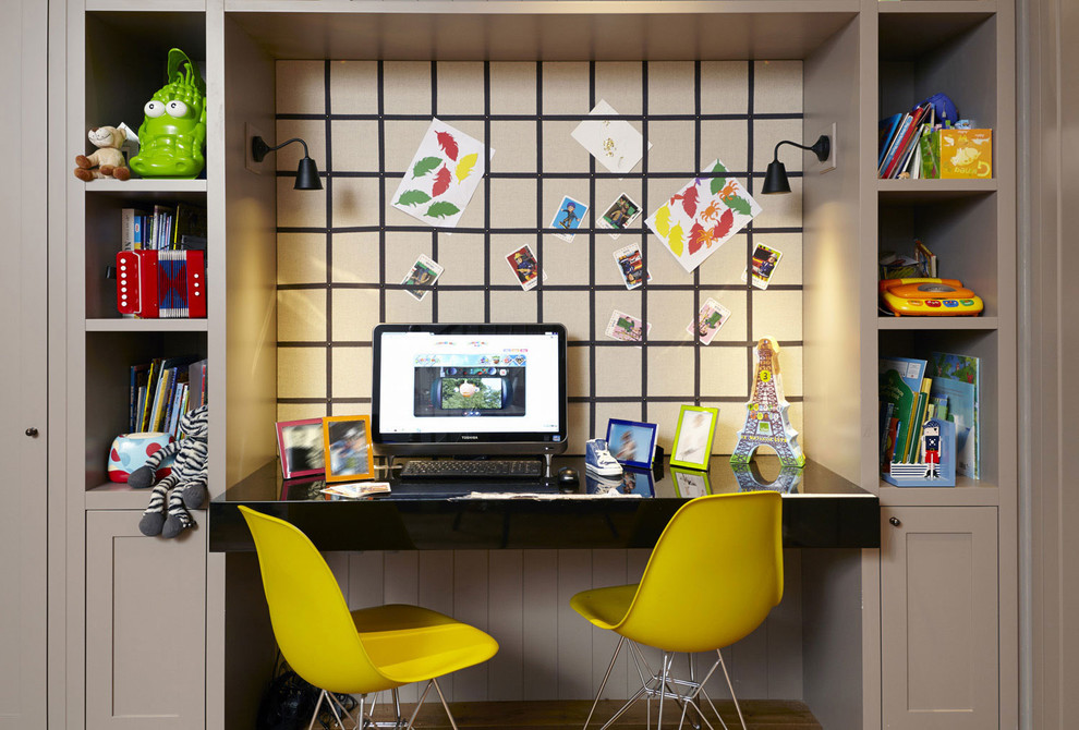 Design ideas for a transitional gender-neutral kids' study room for kids 4-10 years old in London with beige walls.