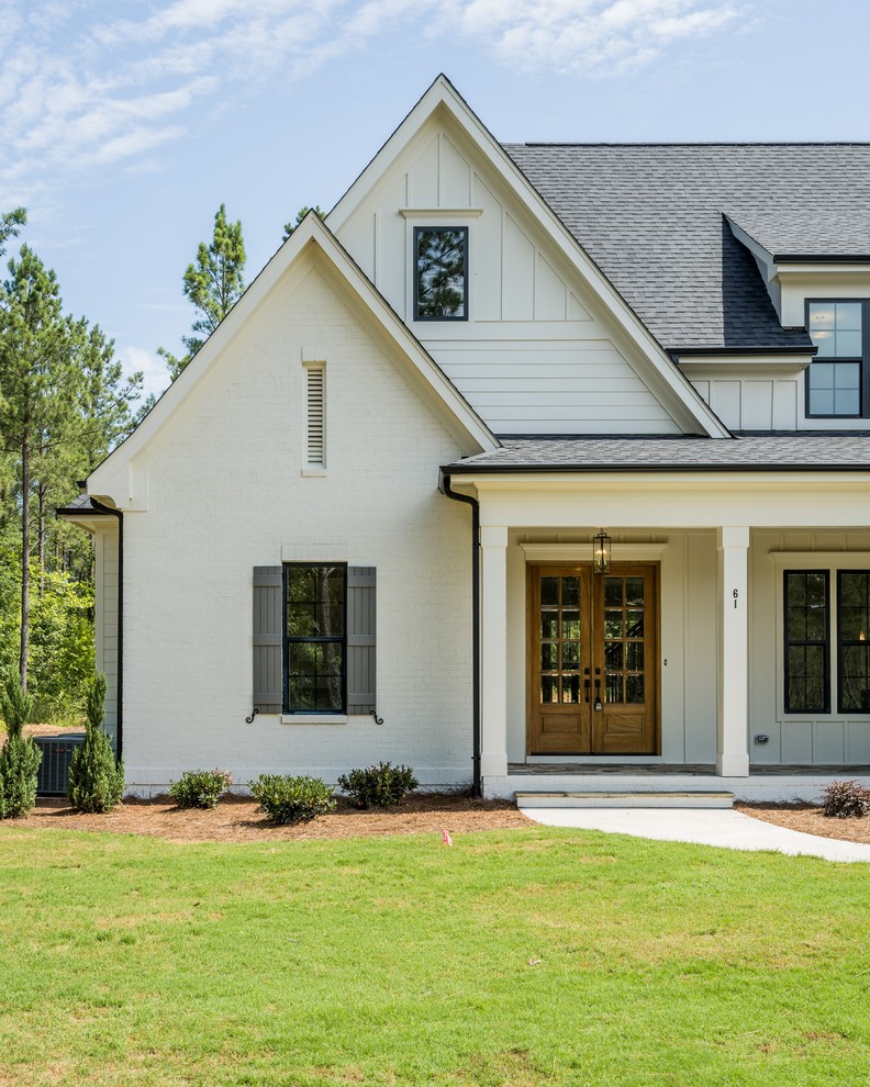 Farmhouse exterior home photo in Raleigh