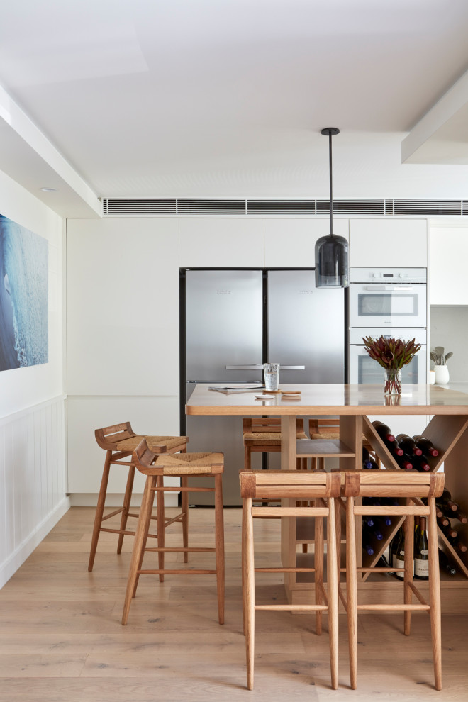 This is an example of a small beach style kitchen in Sunshine Coast.