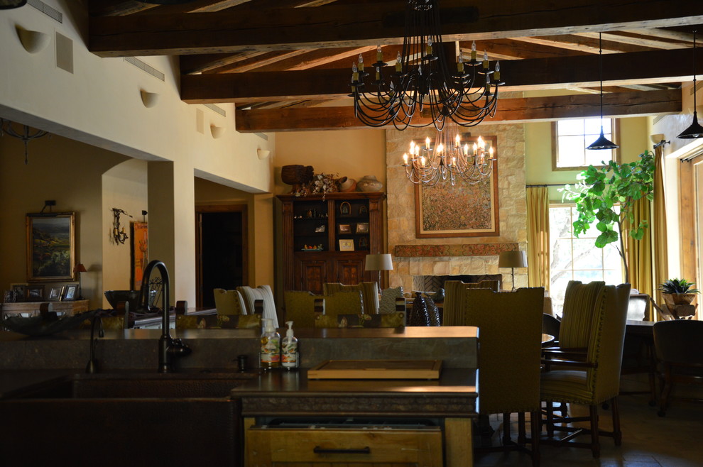 Open concept kitchen - large rustic galley travertine floor open concept kitchen idea in San Francisco with a farmhouse sink, marble countertops, beige backsplash, colored appliances, shaker cabinets, light wood cabinets and two islands