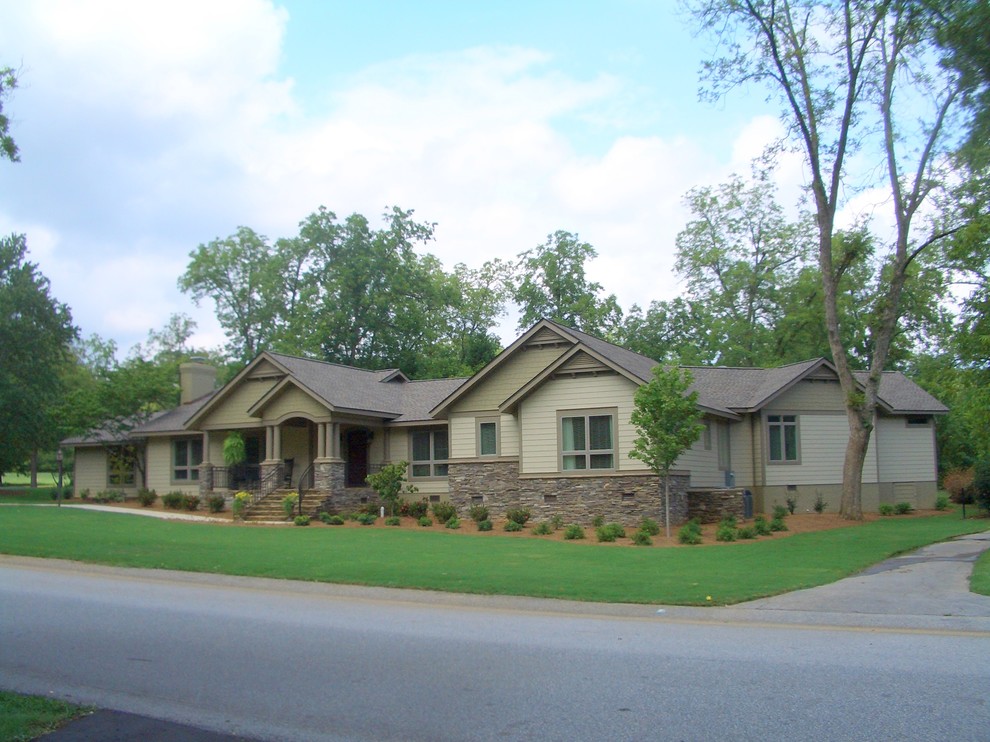 Large transitional beige one-story concrete fiberboard gable roof idea