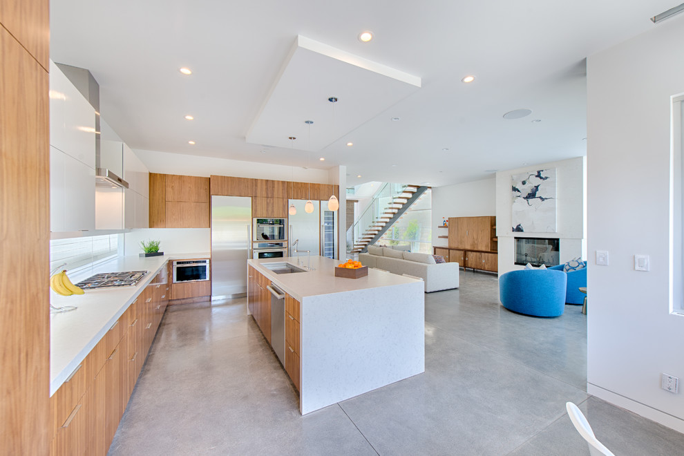 Contemporary kitchen in Los Angeles with concrete floors.