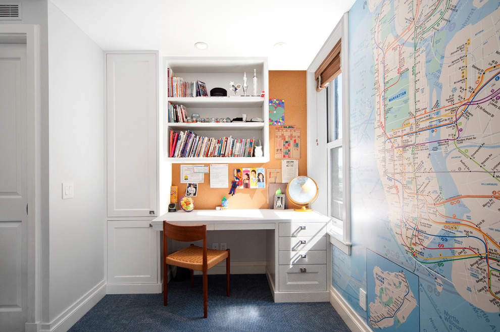 Inspiration for a mid-sized transitional study room in New York with grey walls, carpet, no fireplace, a built-in desk and blue floor.