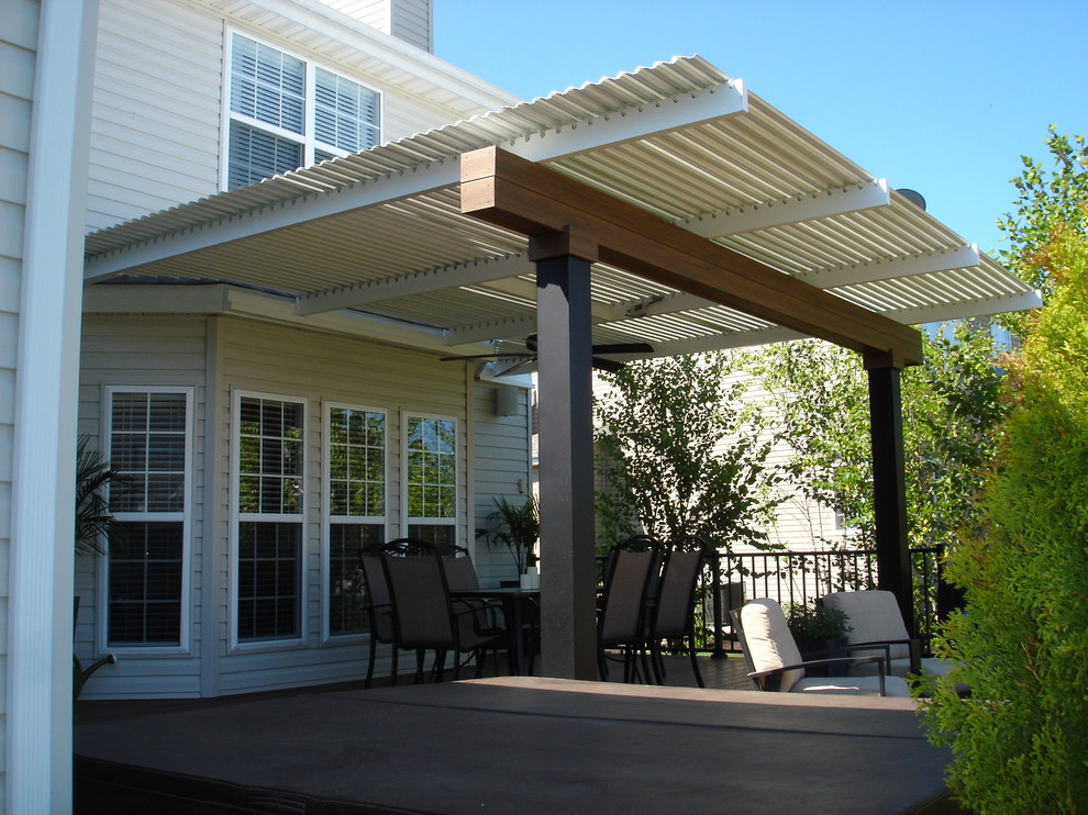This is an example of a mid-sized contemporary deck in St Louis.