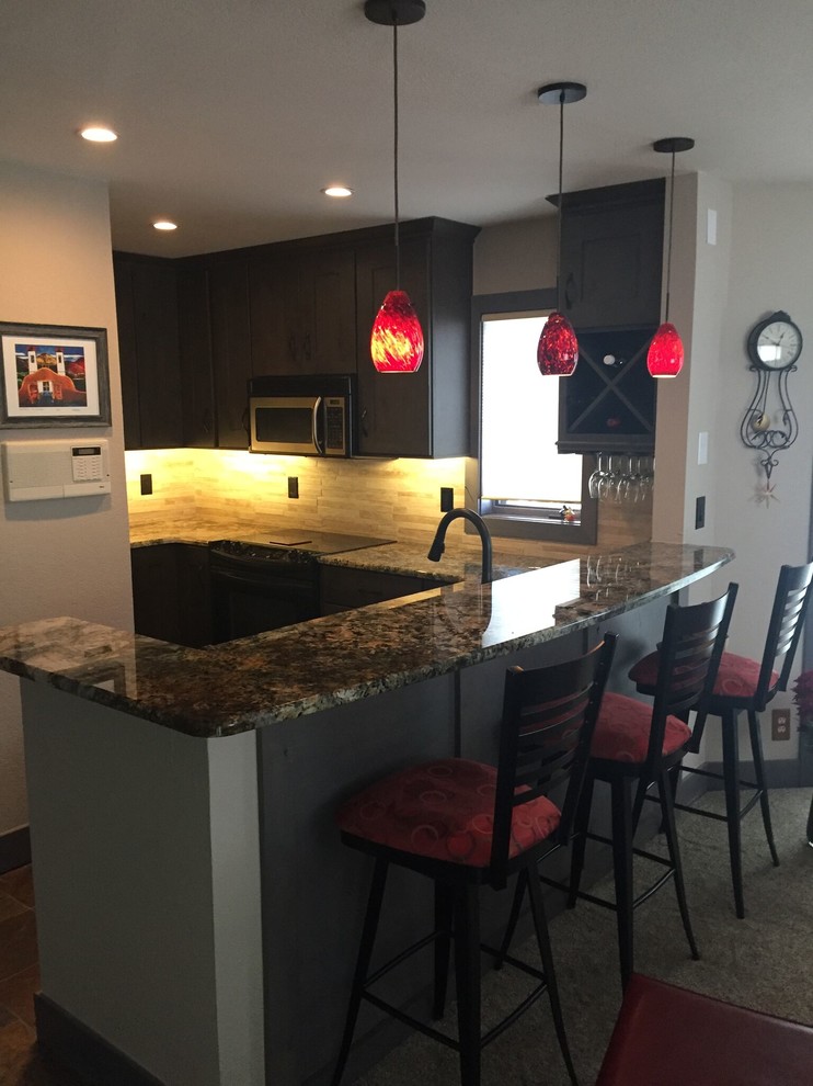 Kitchen pantry - small u-shaped kitchen pantry idea in Denver with a drop-in sink, recessed-panel cabinets, gray cabinets, granite countertops, beige backsplash, stainless steel appliances and a peninsula