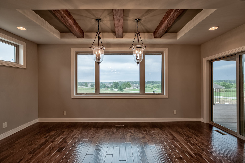 This is an example of a transitional dining room in Omaha.