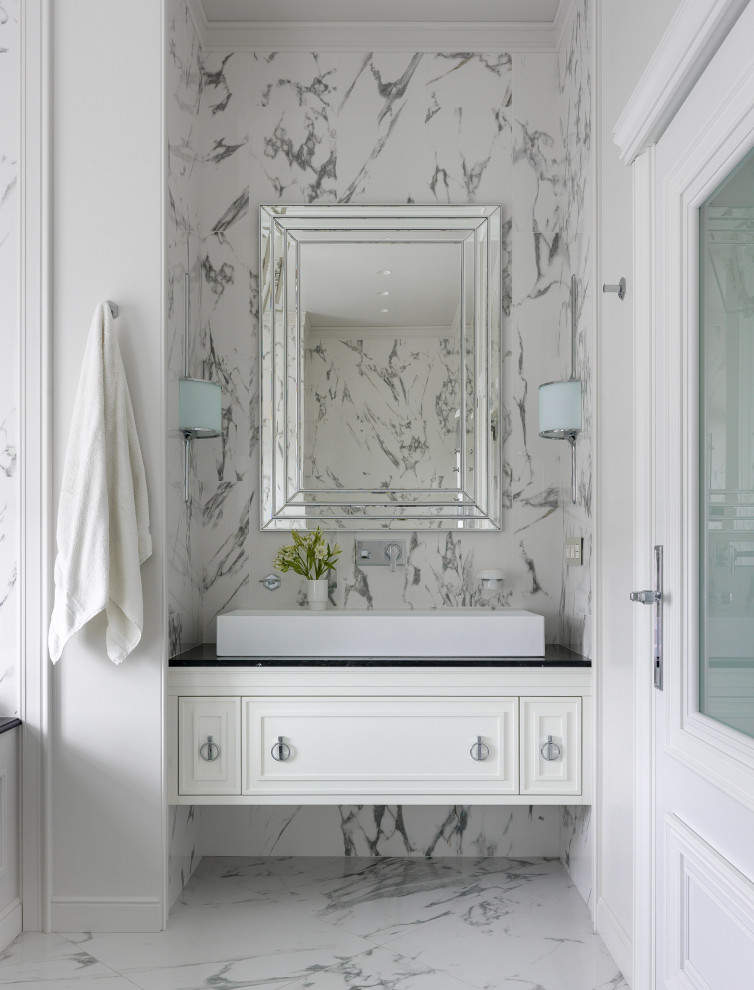 Inspiration for a transitional master bathroom in Other with white cabinets, an alcove tub, white tile, a vessel sink, black benchtops, a single vanity and a built-in vanity.