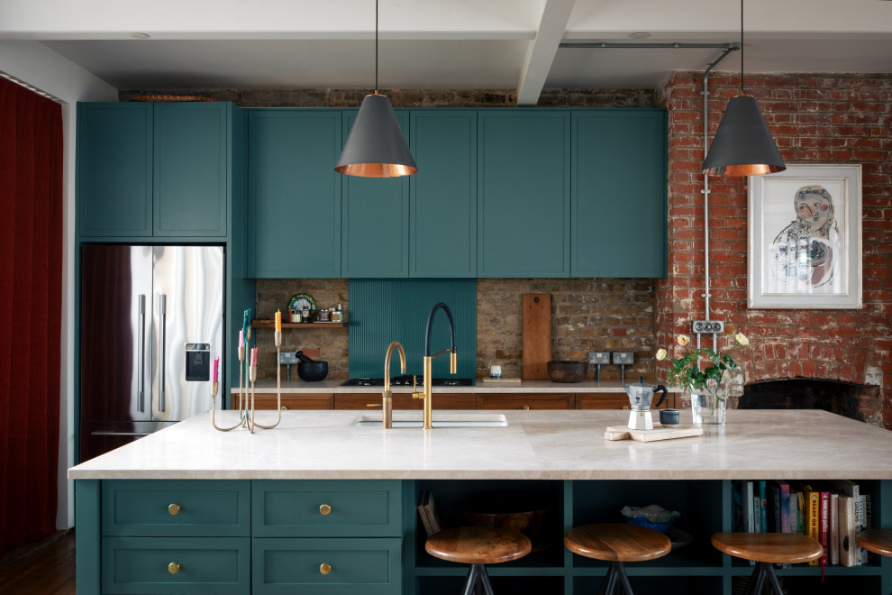 Photo of an industrial kitchen/diner in London with an island.
