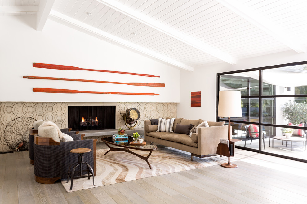 Inspiration for a large midcentury formal open concept living room in Los Angeles with white walls, light hardwood floors, a standard fireplace, a tile fireplace surround and no tv.