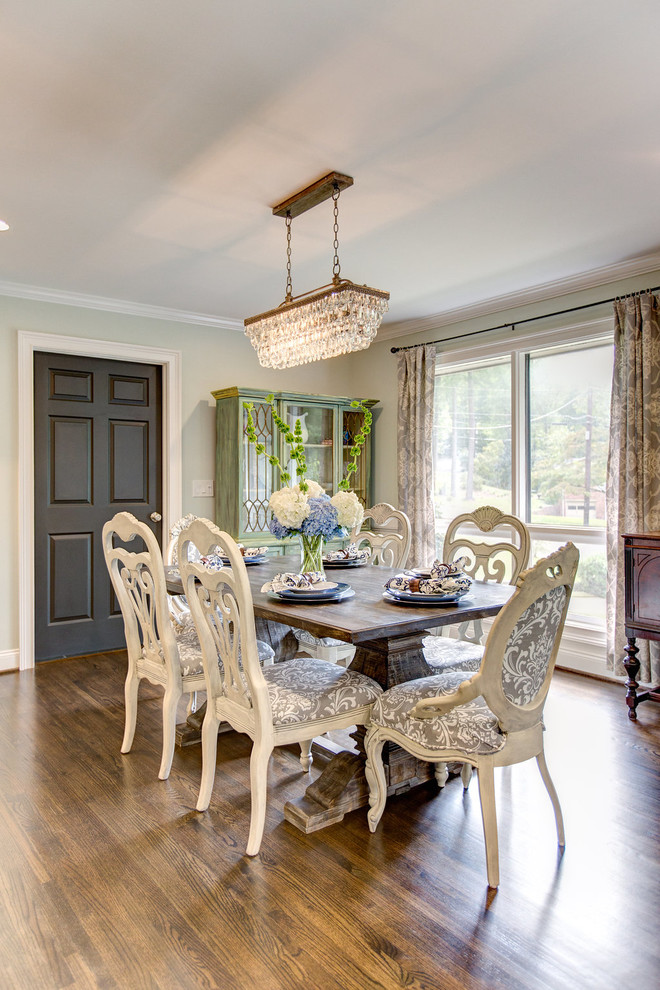 Example of a mid-sized transitional medium tone wood floor kitchen/dining room combo design in Birmingham with gray walls