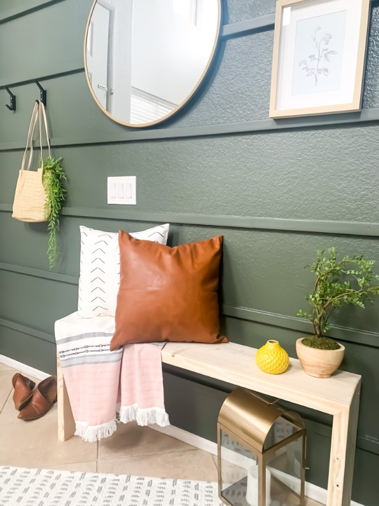 Foto de distribuidor tradicional renovado pequeño con paredes verdes, suelo de baldosas de cerámica, puerta simple y machihembrado
