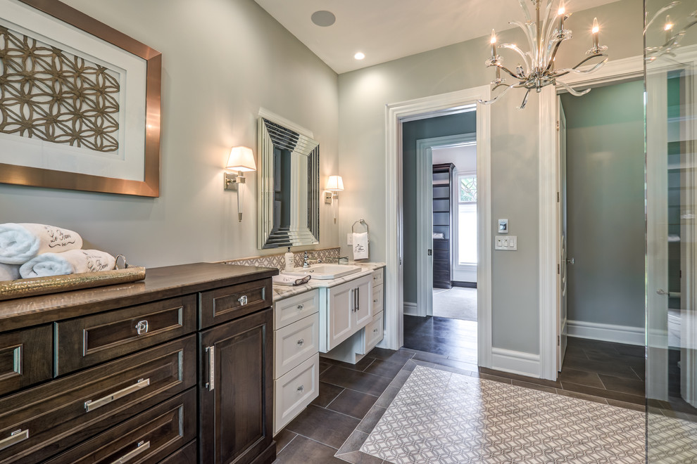 Inspiration for a large transitional master bathroom in Other with beaded inset cabinets, white cabinets, a corner shower, multi-coloured tile, grey walls, an integrated sink and granite benchtops.