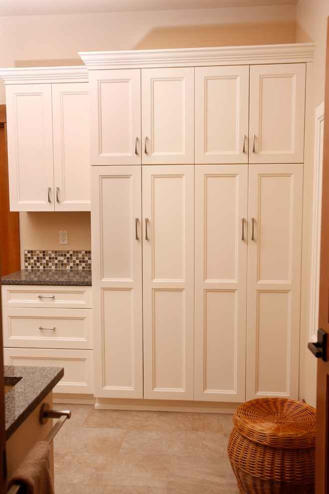 Laundry room - rustic laundry room idea in Seattle