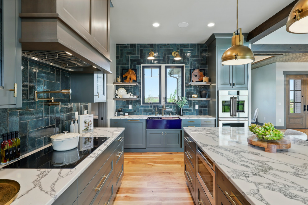 Example of a transitional kitchen design in Denver