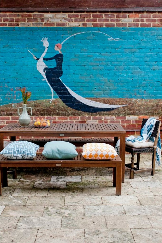 Inspiration for an eclectic courtyard patio in Perth with no cover.