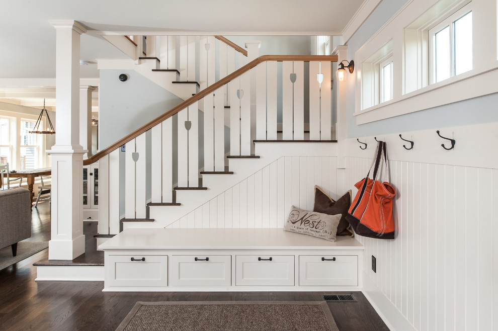 Traditional entryway in Seattle with dark hardwood floors.