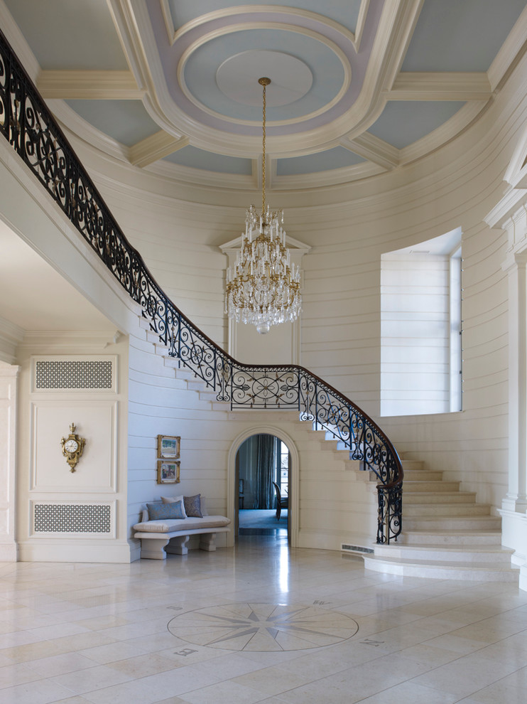 Traditional foyer in Atlanta with white walls.