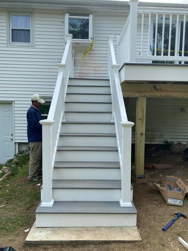 Inspiration for a mid-sized backyard second story deck remodel in Boston with no cover